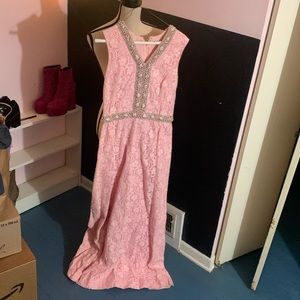 Vintage 60s/70s formal pink dress, worn around arms and inside back zipper